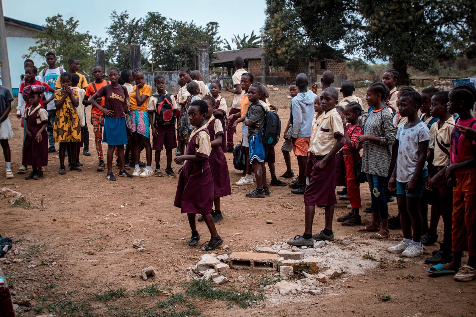 Students gathered outdoors at a school